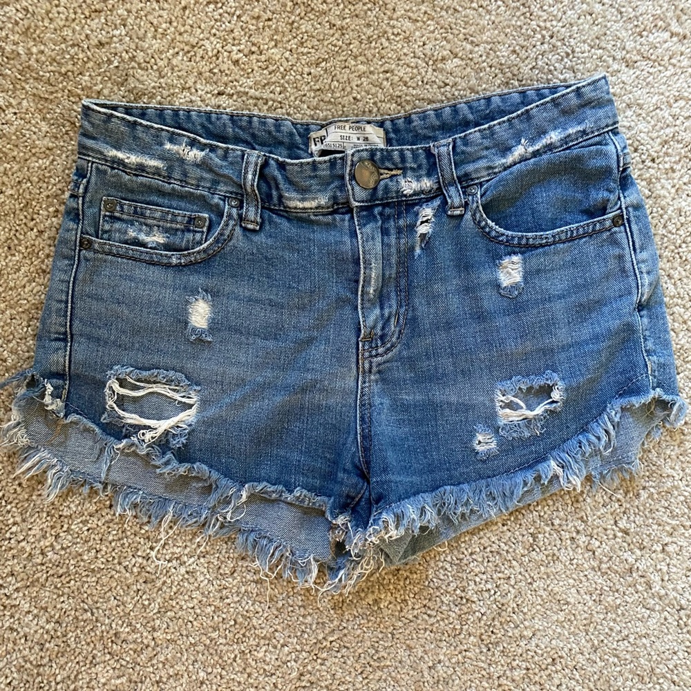 Free People destressed denim shorts